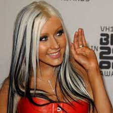 To treat your bob with a shiny finish like the one in the picture, moisturize your hair with a light oil. Black Hair With Blonde Hair Underneath Novocom Top