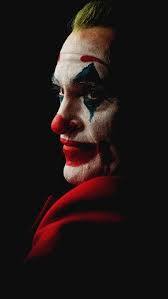 Joaquin Phoenix Joker Black Background 4k Ultra Hd Mobile Wallpaper Joker Wallpapers Joker Hd Wallpaper Joker Wallpaper