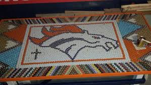 A Fan S Bottle Cap Table Way Cool Bottle Cap Table Bottle Cap Crafts Bottle Cap Art