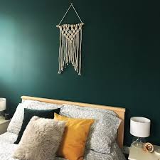 Though there is not anything wrong in painting your living room in neutral colours, the truth is that these colours are safe and not in any respect interesting. Macrame Dark Green Mustard And Gold Accents With Glass Lamps Bedroom Green Bedroom Walls Dark Green Living Room Green Bedroom Decor