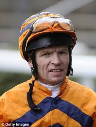 Four jockeys charged after corruption inquiry