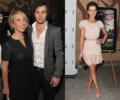 Wearing a grimy grey sweatshirt. Pictures Of Aaron Johnson And Sam Taylor Wood At Nowhere Boy La Premiere With Kate Beckinsale Popsugar Celebrity Uk