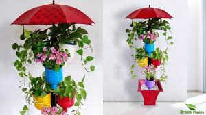 You don't need to spend a dime on them, they are cheap. Flower Garden Tower Pots Making With Recycle Plastic Bottles For Indoor Recycle Plastic Bottles Diy Plant Hanger Plastic Bottle Art