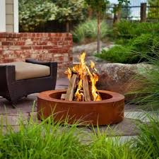 Real Flame Orbea 38 In Cor Ten Steel Wood Burning Round Fire Pit 903 The Home Depot Outdoor Fire Pit Corten Steel Fire Pit