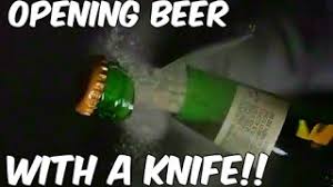 Clip the two bottle tops together then push it up effortlessly. Cutting Beer Open With A Knife Awesome Slow Mo Lab Youtube