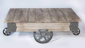 This coffee table sits on iron wheels that can be locked into place. Rezfurniture Vintage Center Coffee Table With Wheels Reviews Wayfair