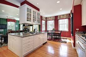 So if you have light brown overhead cabinets, you can use a darker shade of brown for the kitchen island, while keeping the countertop uniform for both. 90 Different Kitchen Island Ideas And Designs Photos Red Kitchen Walls White Kitchen Traditional Traditional White Kitchen Cabinets