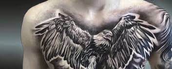 Eagle and scull tattoo on the chest and stomach. Top 97 Best Eagle Tattoo Ideas In 2021