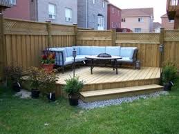 Instead of choosing cheap flowers and garden designs, focus on options which are low maintenance. Small Yard With A Patio Backyard Design Ideas