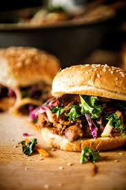 Pour the remaining sauce over the top of the pork. Slow Cooker Hoisin Sliders With Sriracha Kale Slaw Girl Carnivore