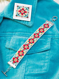 Discover thousands of more patterns to print online instantly at crosstitch.com. Cross Stitch Poinsettia Jewelry Set Ex00277