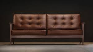 Amazing offers on brown leather sofas! The Mid Century Show Wood Sofa Brown Leather Century Modern