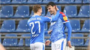 Wolfsburg beat holstein kiel to stay in bundesliga. 2rlo59i2gifuam