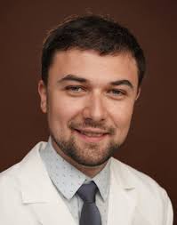 Michael Babigumira, MD