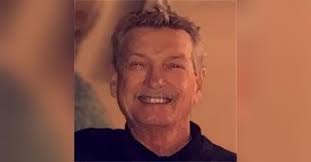 John E. Rolka Obituary