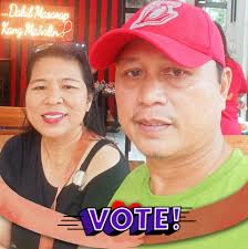 The St. La Salle Hall is illuminated in green and maroon to highlight the  partnership of De La Salle University and University of the Philippines for  social entrepreneurship and service learning. DLSU