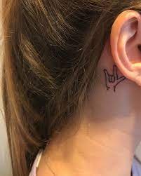 Asl Tattoo Behind Ear Tattoos Wrist Tattoos For Women Wolf Tattoos For Women