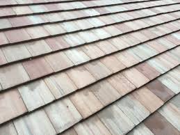 Roof tiles are designed mainly to keep out rain, and are traditionally made from locally available materials such as terracotta or slate. Flat Roof Tile Installation Floridian Blend Miami General Contractor