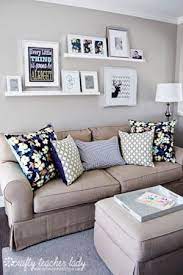 Cute Way To Hang Shelves Display Photos By Delia Salas Pequenas Decoracao Sala Pequena Decoracao Sala