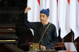 Presiden jokowi mengenakan baju adat sabu dari nusa tenggara timur (ntt) saat menghadiri. Rsei5x7jorclcm