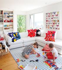 10 Family Friendly Living Rooms You Ll Want To Hang Out In Family Friendly Living Room Living Room Playroom Kids Living Rooms