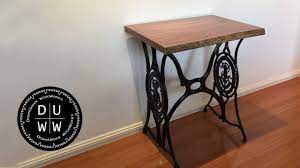 Some have tables, but others are portable antique singer sewing machines. Antique Singer Sewing Machine Stand Live Edge Table Youtube