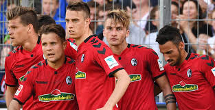 If you are a soccer lover and like to watch the matches then you know that in a real game the teams kits different kits means uniforms. Sc Freiburg Hummel 2017 18 Home Kit Todo Sobre Camisetas