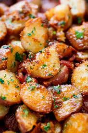 Roasted Garlic Potatoes With Butter Parmesan Best Roasted Potatoes Recipes Parmesan Potato Recipe Food