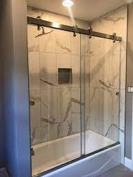 Maybe you would like to learn more about one of these? Barndoor Style Bypass Doors On Tub Tub Shower Doors Glass Tub Enclosure Shower Sliding Glass Door