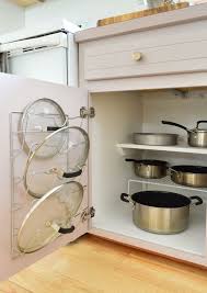 Mount file holders inside to store your plastic container lids. How We Store Everything In Our Much Smaller Kitchen Young House Love