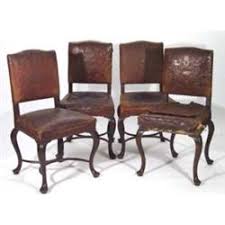 How many leather dining chairs? Set Of Four Victorian Oak Red Leather Upholstered Dining Chairs With Curved Cross Stretchers And Pad