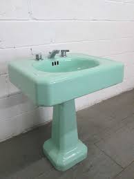 pair vintage porcelain pedestal sinks