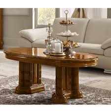 Many of the coffee tables in our guide come with storage space, ideal for hiding away living room clutter, or indeed for hiding away cocktail paraphernalia. Versailles Italian Coffee Table Walnut New Room Style