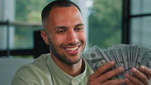 Smiling Man Counting Money Dollars