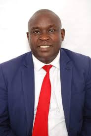 David Kiplagat's Biography and Community Involvement