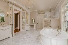 Master Bathroom With Crema Marfil Marble Drop In Bathtub Radford Cabinets Inset Cabinets Rain Sho Luxury Bathroom Master Bathroom Design Mansion Bathrooms