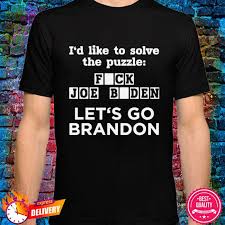 The zigsaw puzzle design shows two orange and green puzzle pieces having a happy big smile. Fjb Let S Go Brandon Game Show Shirt Let S Go Brandon Solve The Puzzle Shirt Hoodie Sweater Long Sleeve And Tank Top