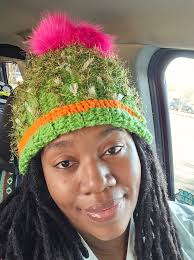 My friend sent me a planter ( she saw a youtube video of me enjoying some  cactusus) I crocheted some cacti and hot glued them in