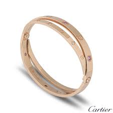 Maybe you would like to learn more about one of these? Cartier Rose Gold Half Diamond And Pink Sapphire Love Bracelet N6705917 For Sale At 1stdibs