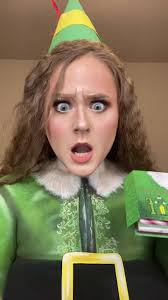 Elf Cutting Snowflakes Scene