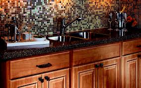 White tiles background bright and clean kitchen with white cabinets, close up. Top 5 Most Durable Countertops Best Materials For Kitchen Bath