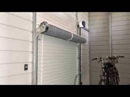 Before you set your garage door opener with your garage door, it's crucial to read the owner's manual. Roll Up Automatic Garage Door Opener Youtube