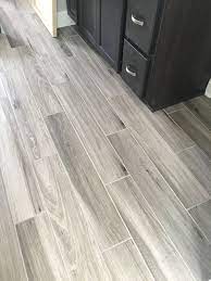 How to install a wood look porcelain plank tile floor. Newly Installed Gray Weathered Wood Plank Tile Flooring Mudroom Foyer Ideas Bathroo Pisos Para Sala Comedor Pisos Para Casas Modernas Piso Interiores