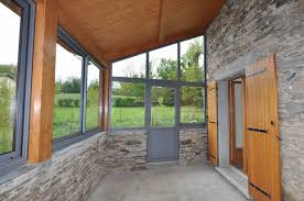 Photo de veranda avec muret. Veranda Pose Sur Mur En Pierre A Laprade De Couleur Grise Alu Pvc Menuiserie