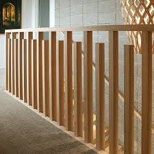 Sleek metal railing in a simple design adds modern flair to the exterior of this home. Modern Stair Railing Modern Stair Railing Exterior Stair Railing Balustrade Design