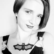 Artist creates bold bat necklace
