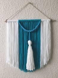 Crafted with 100 percent cotton cords, wooden beads, and metal, this macrame will the designer was inspired to create a macrame wall hanging that could be used as an alternative wedding arch. Excited To Share This Item From My Etsy Shop Macrame Wall Hanging Yarn Tapestry Boho Style Wall Hanging Ta Diy Wall Hanging Yarn Diy Yarn Crafts Yarn Diy