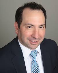 About H. Benjamin Sharlin