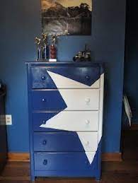 Red painted furniture hand painted dressers painted drawers chalk paint furniture diy this dresser was a pain in the butt, but totally worth all the time. Painted Dresser Thinking I Could Stencils Paint On A Train Or Something Like That Avengers Room Painted Dresser Big Boy Room