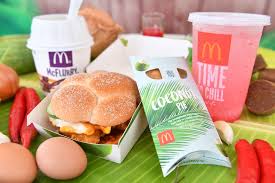 Nasi lemak bk4 serves up the classic nasi lemak bungkus and if you live somewhere in puchong or kinrara chances are you have eaten their nasi lemak from mamak tabletops. Mcdonald S Jumps On Board The Local Train With Its Nasi Lemak Burger Chendol Mcflurry And Pandan Coco Frappe Coconuts Singapore